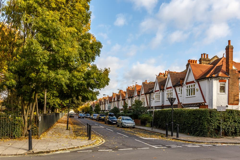 row of residential houses down a road